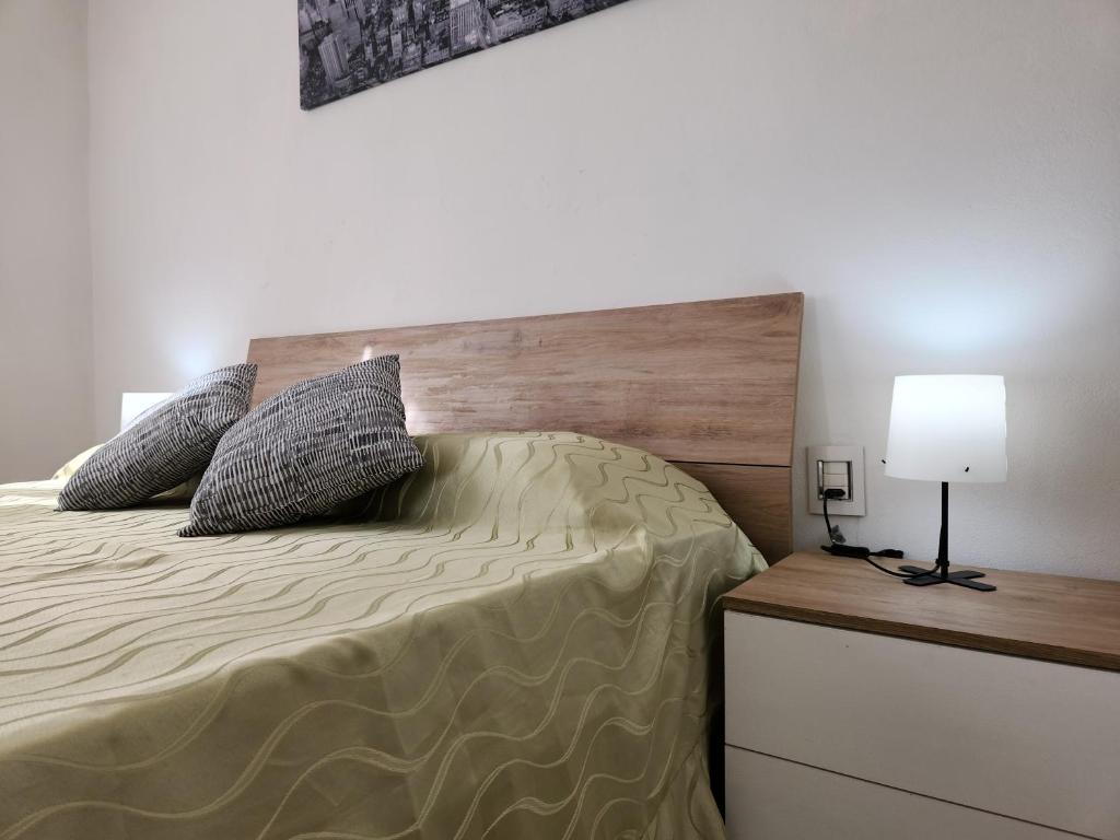 Postel nebo postele na pokoji v ubytování La Casetta di GioGiò