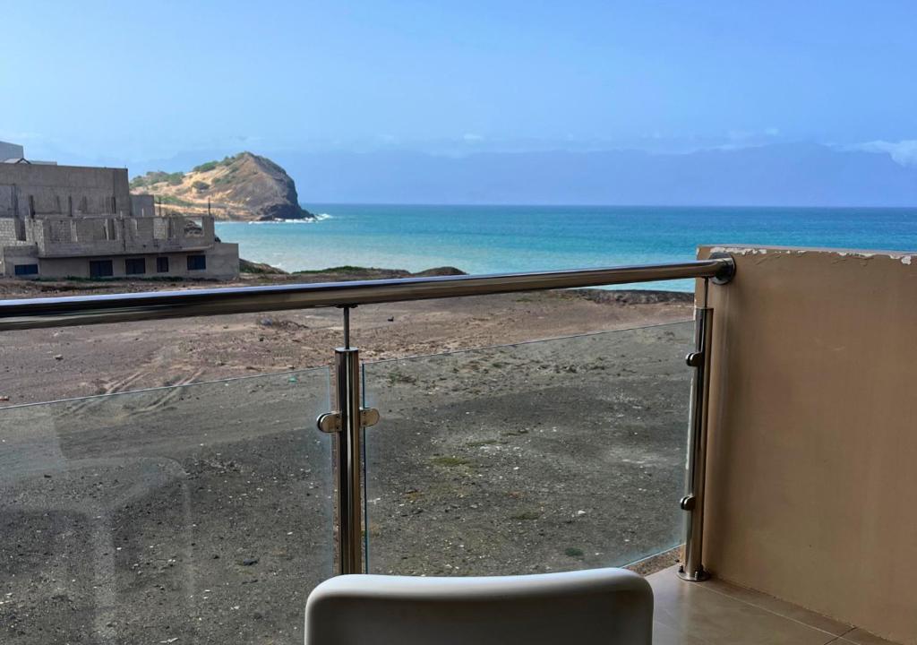 a balcony with a view of the ocean at MonteCara View T1 in Mindelo