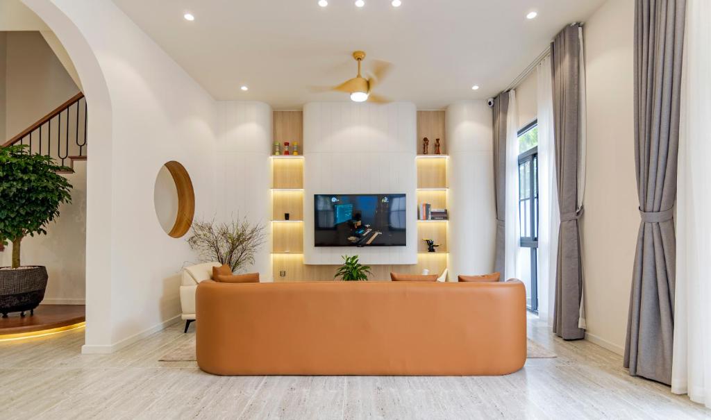 Et tv og/eller underholdning på Maison Villa Premier Palm Marina C5