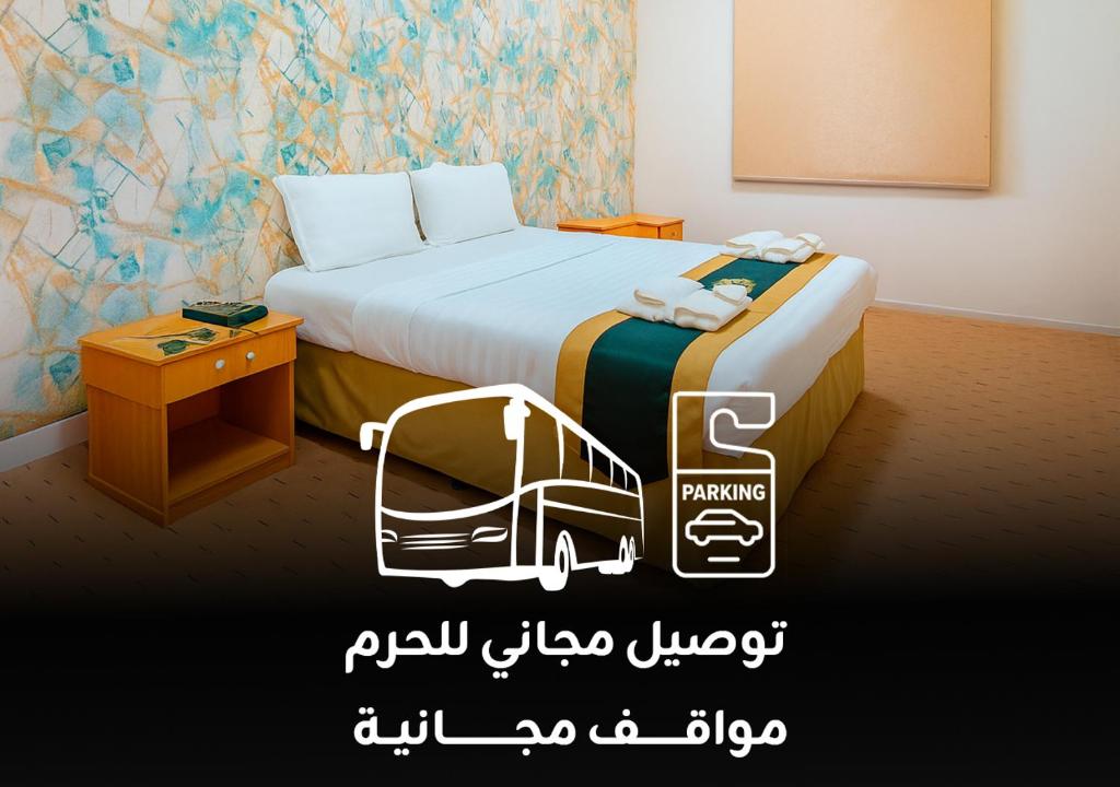 Katil atau katil-katil dalam bilik di Paradise Land Hotel Makkah