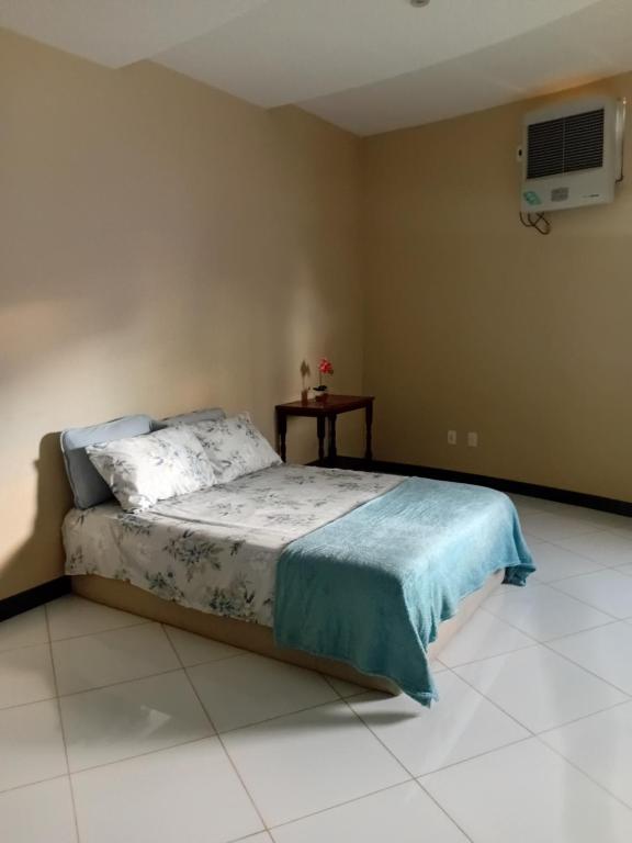 En eller flere senge i et værelse på Casa Branca