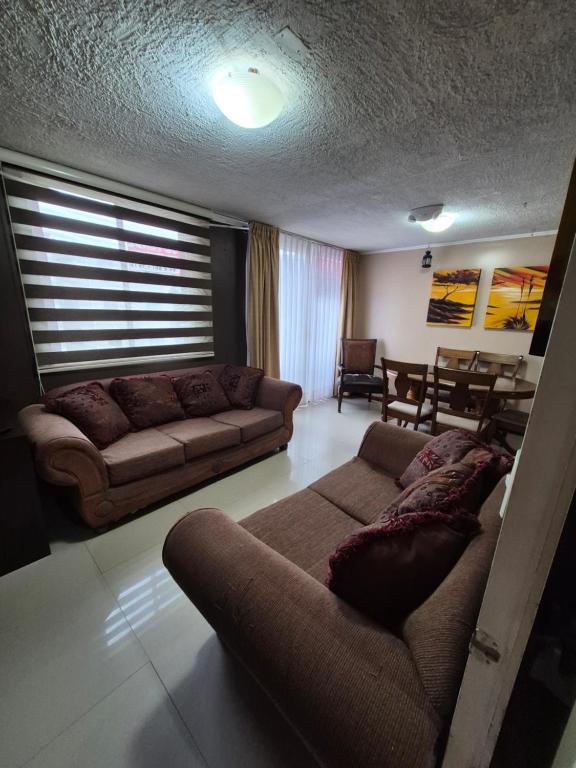 Posezení v ubytování Departamento frente al mar