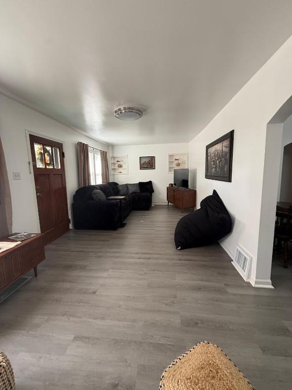 a large living room with couches and a couch at Union Street Bungalow in Saint Joseph