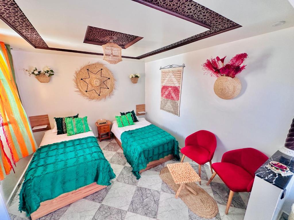 Ένα ή περισσότερα κρεβάτια σε δωμάτιο στο Studio de vacances