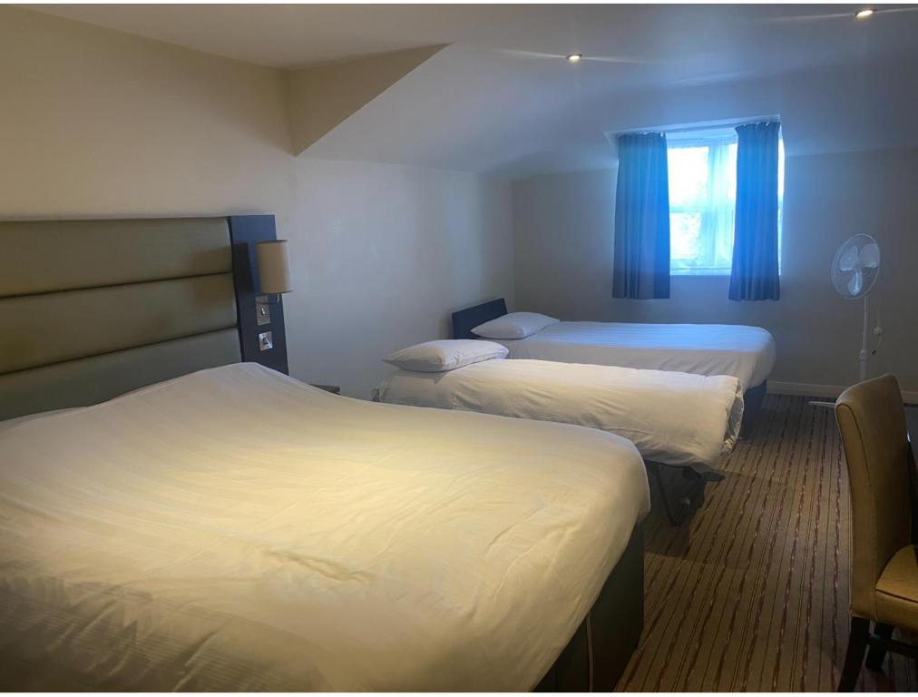 Ένα ή περισσότερα κρεβάτια σε δωμάτιο στο The Chetwode Arms