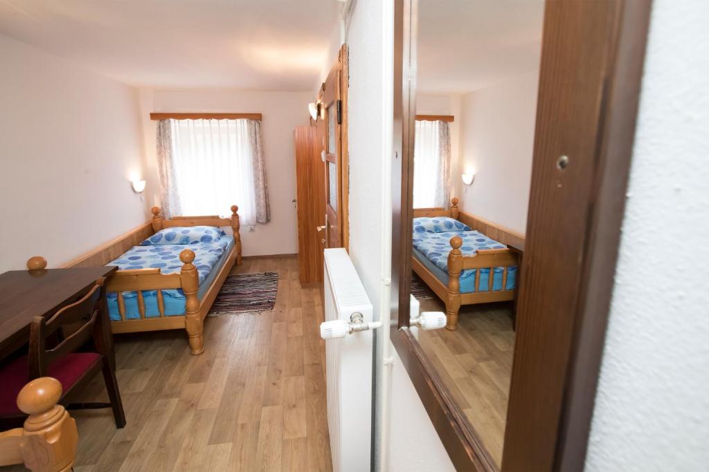 Postel nebo postele na pokoji v ubytování Turistična kmetija Gartner