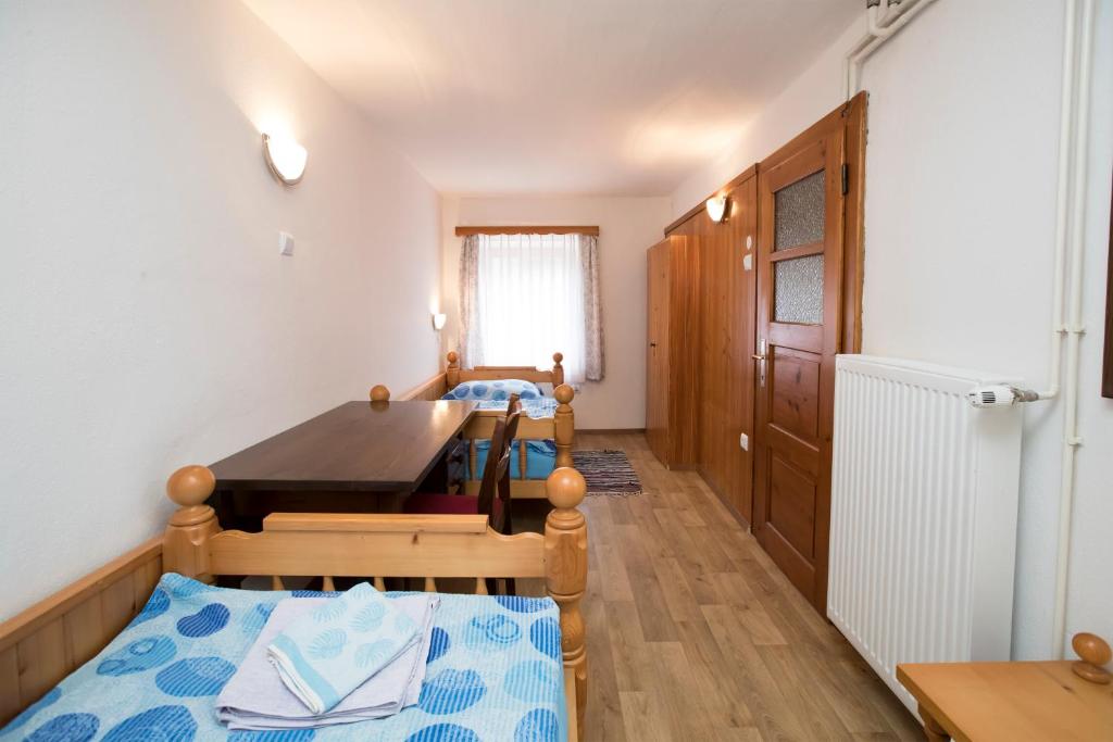 Postel nebo postele na pokoji v ubytování Turistična kmetija Gartner