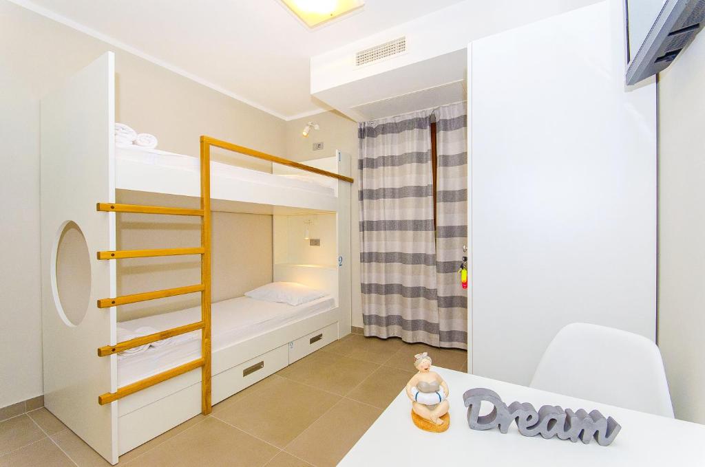 Posteľ alebo postele v izbe v ubytovaní Hostel Dvor