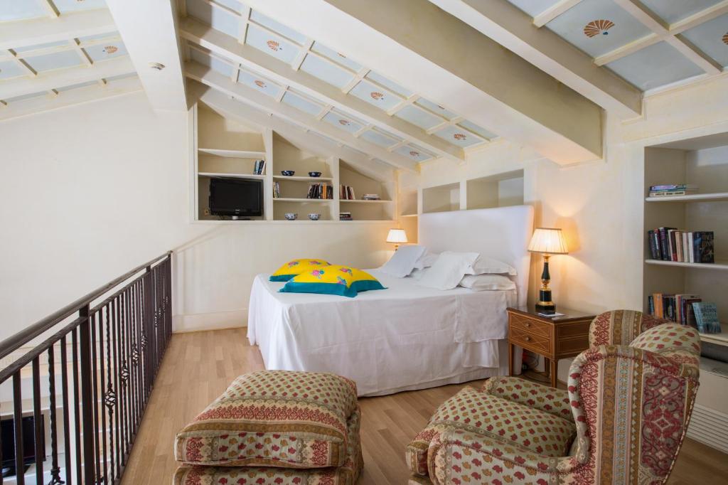 Postel nebo postele na pokoji v ubytování Grand Hotel Plaza