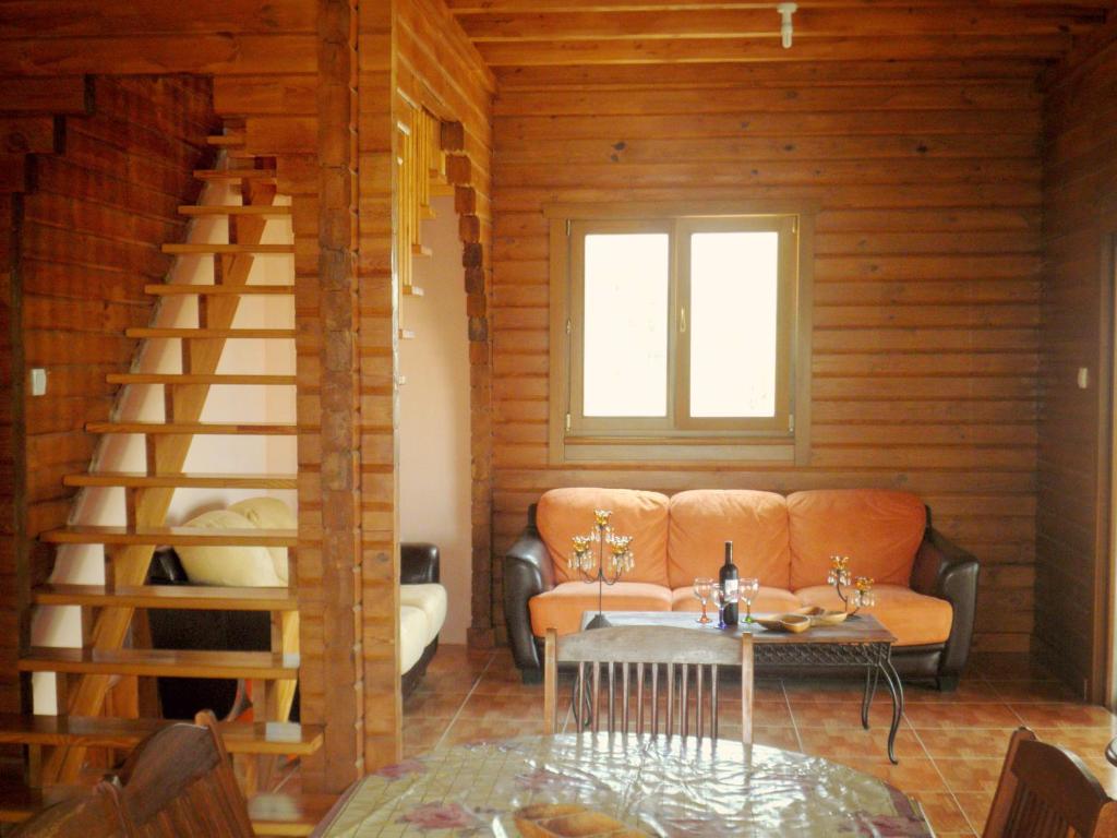 Posezení v ubytování Agros Timber Log House