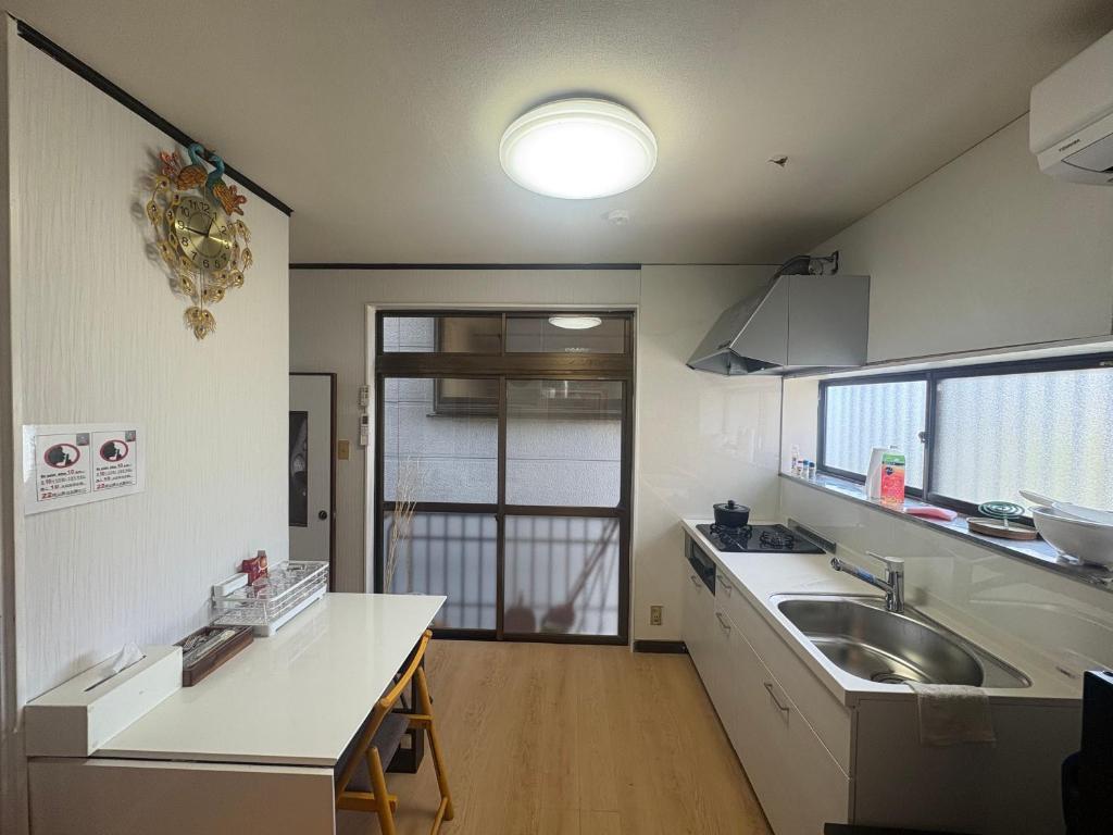 a kitchen with a sink and a counter top at 东京瑞江独栋直达新宿秋叶原 in Tokyo