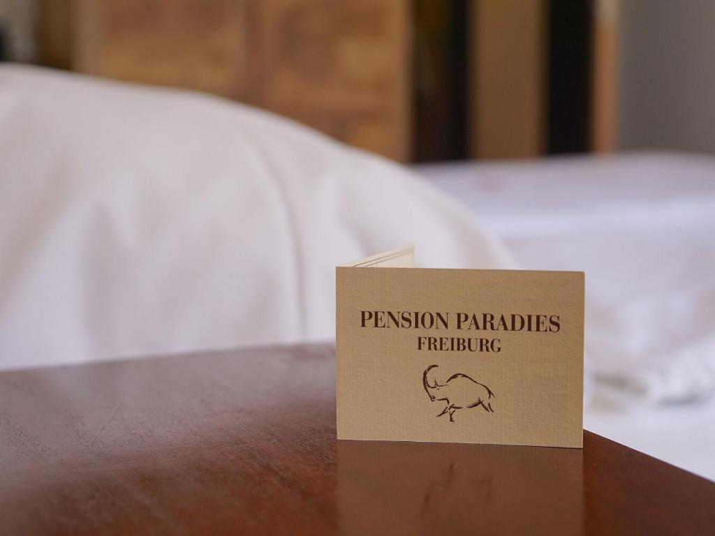 Postel nebo postele na pokoji v ubytování Pension-Gaststätte Paradies