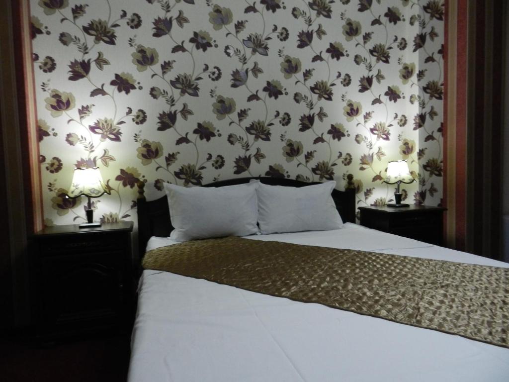 Postel nebo postele na pokoji v ubytování Hotel Marinii