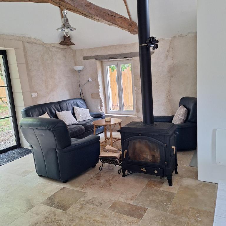 Χώρος καθιστικού στο Gîte de la douce évasion