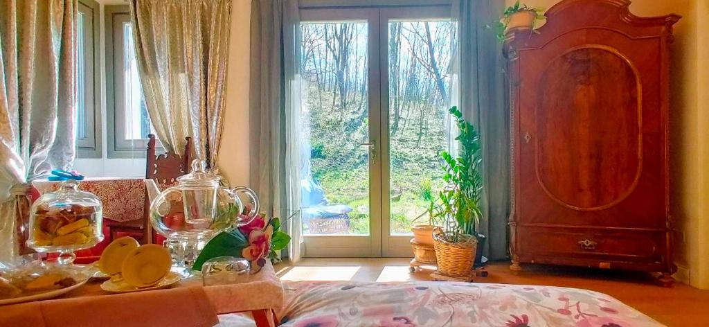 En eller flere senge i et værelse på I Custodi del Bosco