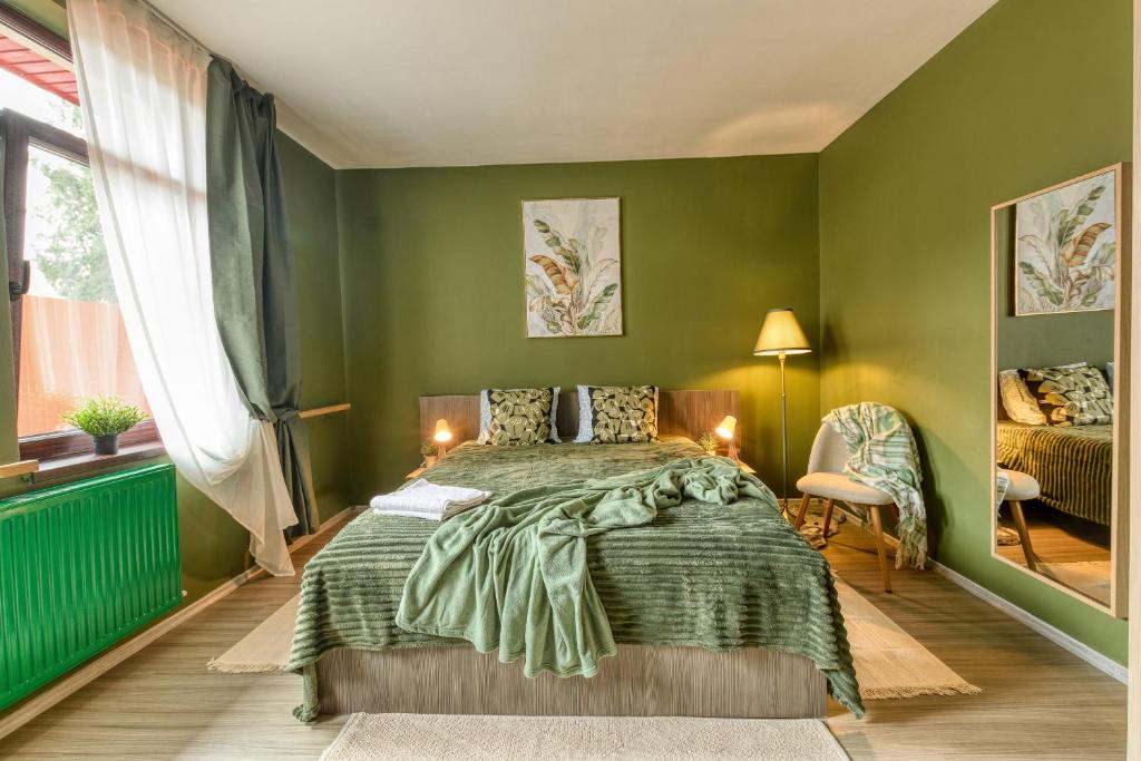 Ένα ή περισσότερα κρεβάτια σε δωμάτιο στο Glow Central Apartment