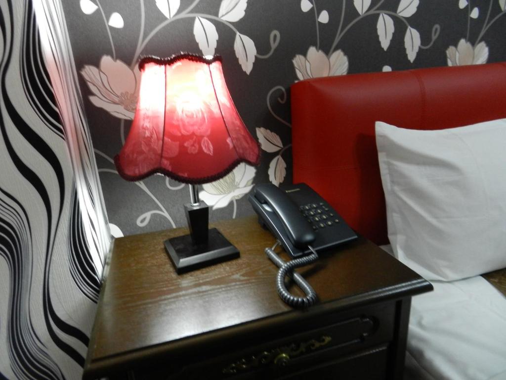 Postel nebo postele na pokoji v ubytování Hotel Marinii