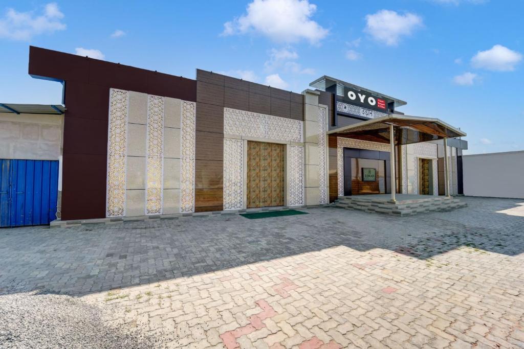 a building with a sign on the front of it at Hotel O UDAAN BANQUET & FILMS in Khagaul