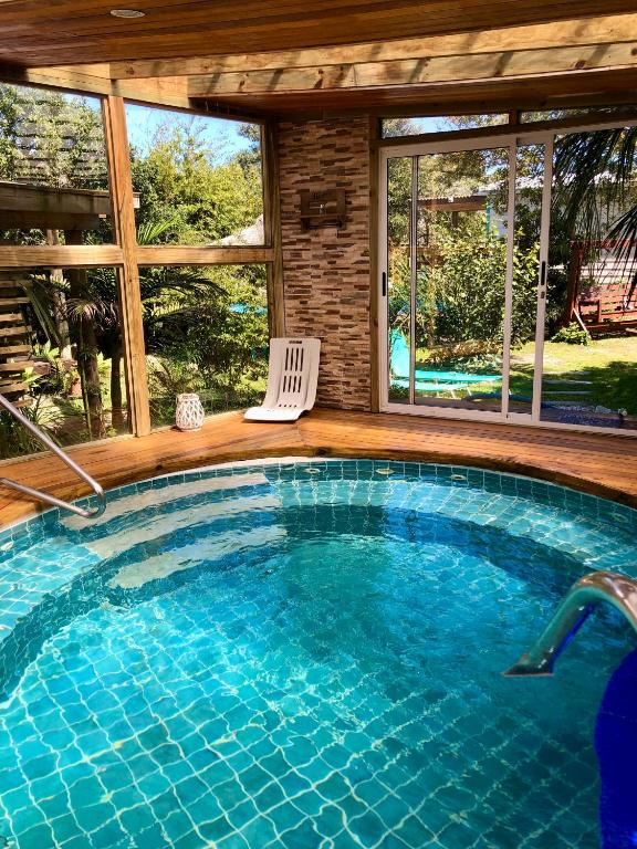 a swimming pool in a house at Posada Agua Marina in La Paloma