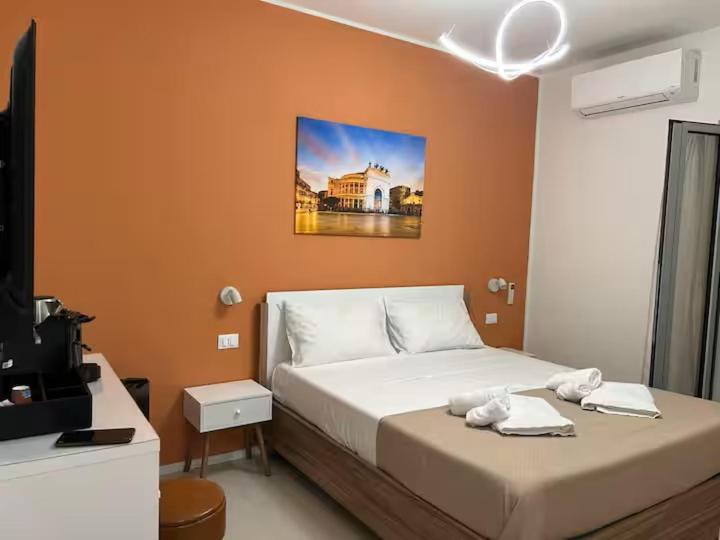 Cama o camas de una habitación en Duecento Rooms