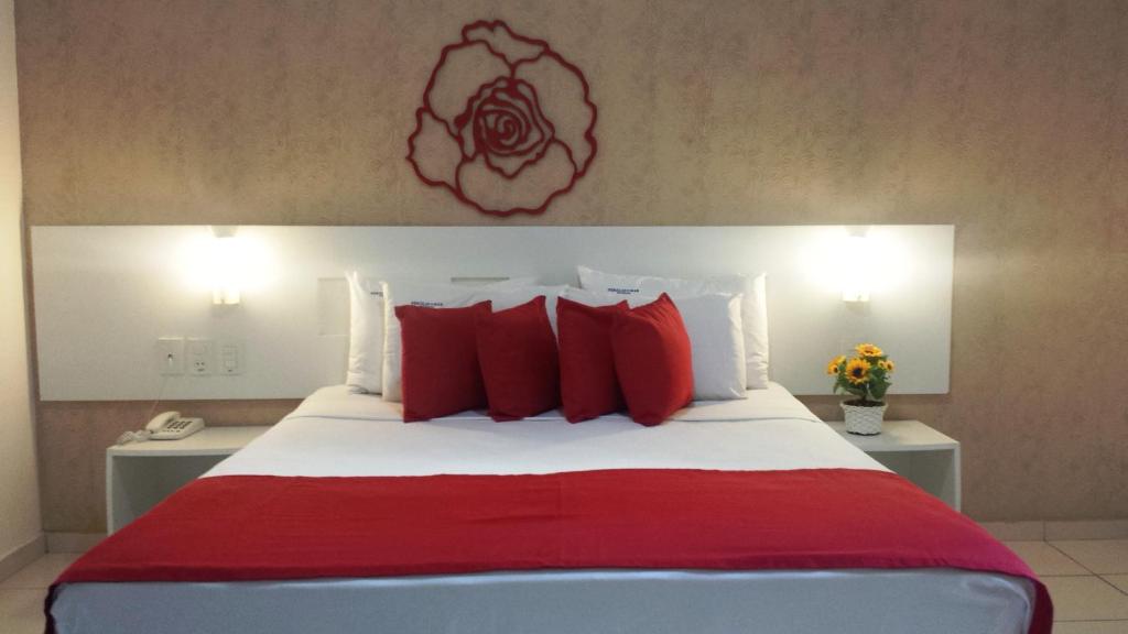 Cama ou camas em um quarto em Pousada Pérola Dourada