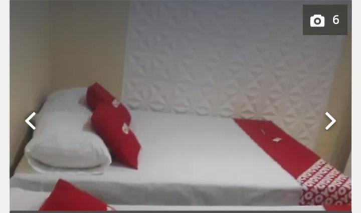 Postel nebo postele na pokoji v ubytování Pousada Lirios