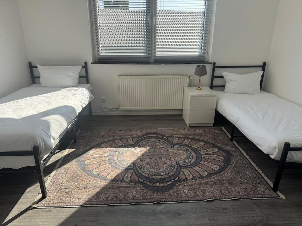 Ένα ή περισσότερα κρεβάτια σε δωμάτιο στο Apartment 20qm Prisdorf