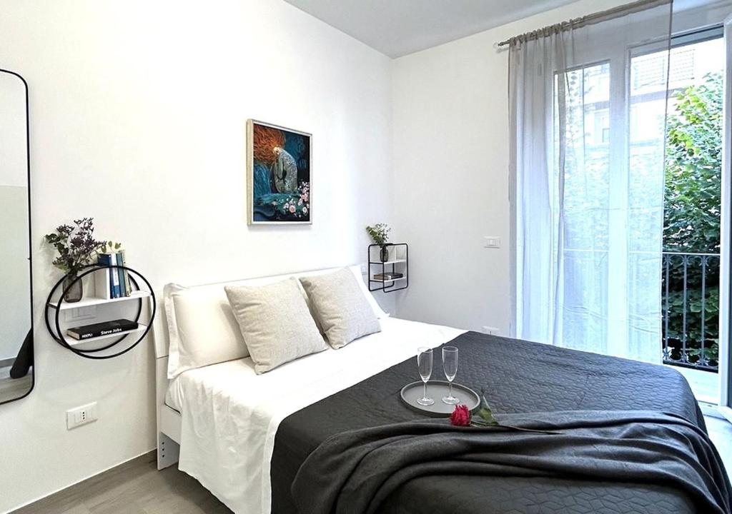 Postel nebo postele na pokoji v ubytování Residence Le Sirene