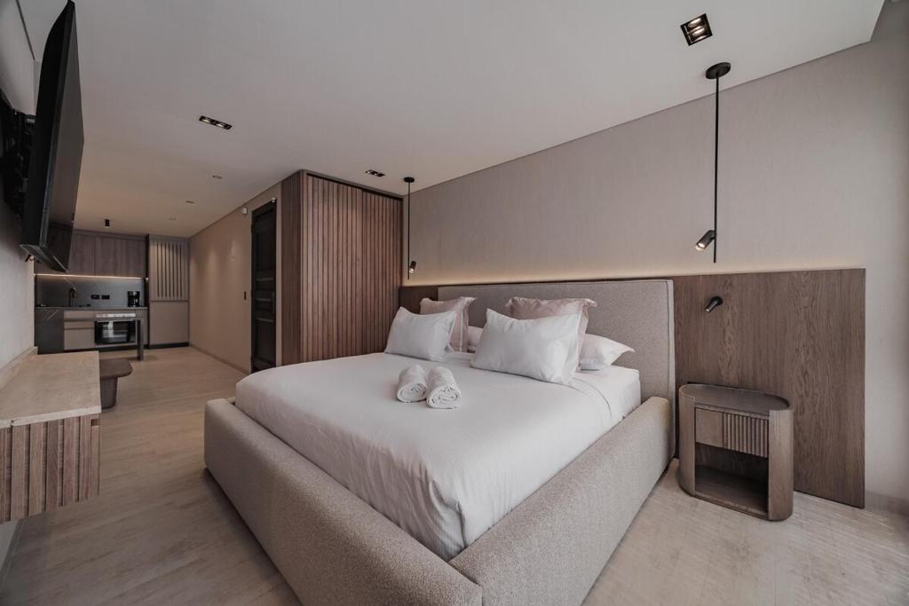 Un pat sau paturi într-o cameră la Modern & Elegant Loft in El Poblado 217