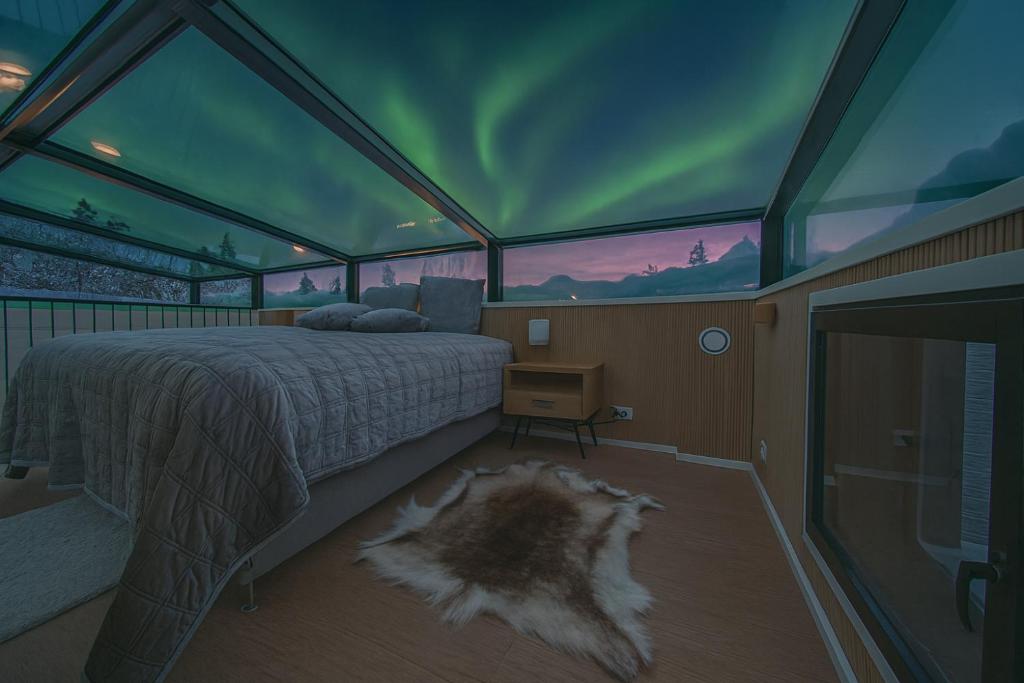 Postel nebo postele na pokoji v ubytování Polaris Igloo by Aavalevi Holidays