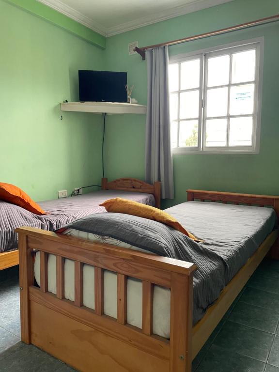 Ein Bett oder Betten in einem Zimmer der Unterkunft Complejo Gago DTO 1