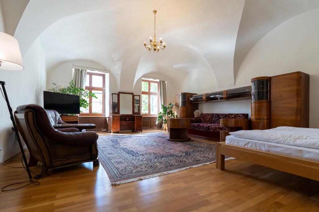 Кровать или кровати в номере Hotel Arkada