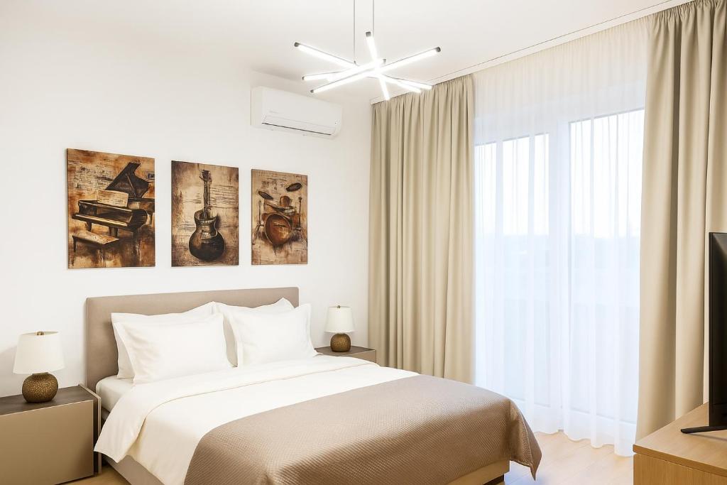 Ένα ή περισσότερα κρεβάτια σε δωμάτιο στο Atria House