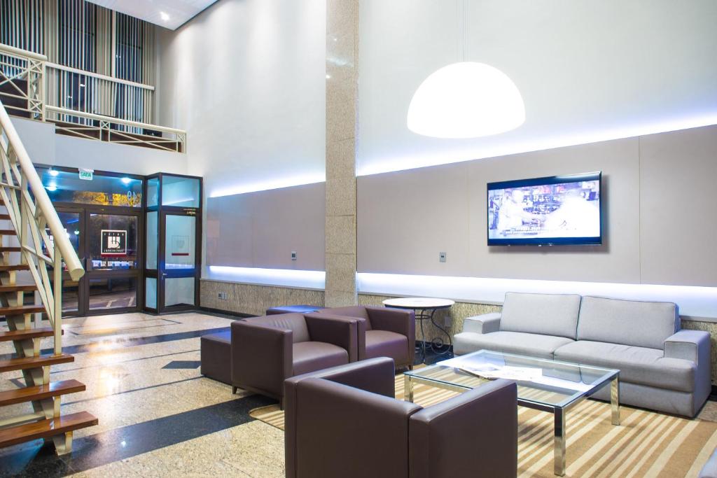 TV a/nebo společenská místnost v ubytování Hotel Continental Business - 200 metros do Complexo Hospitalar Santa Casa