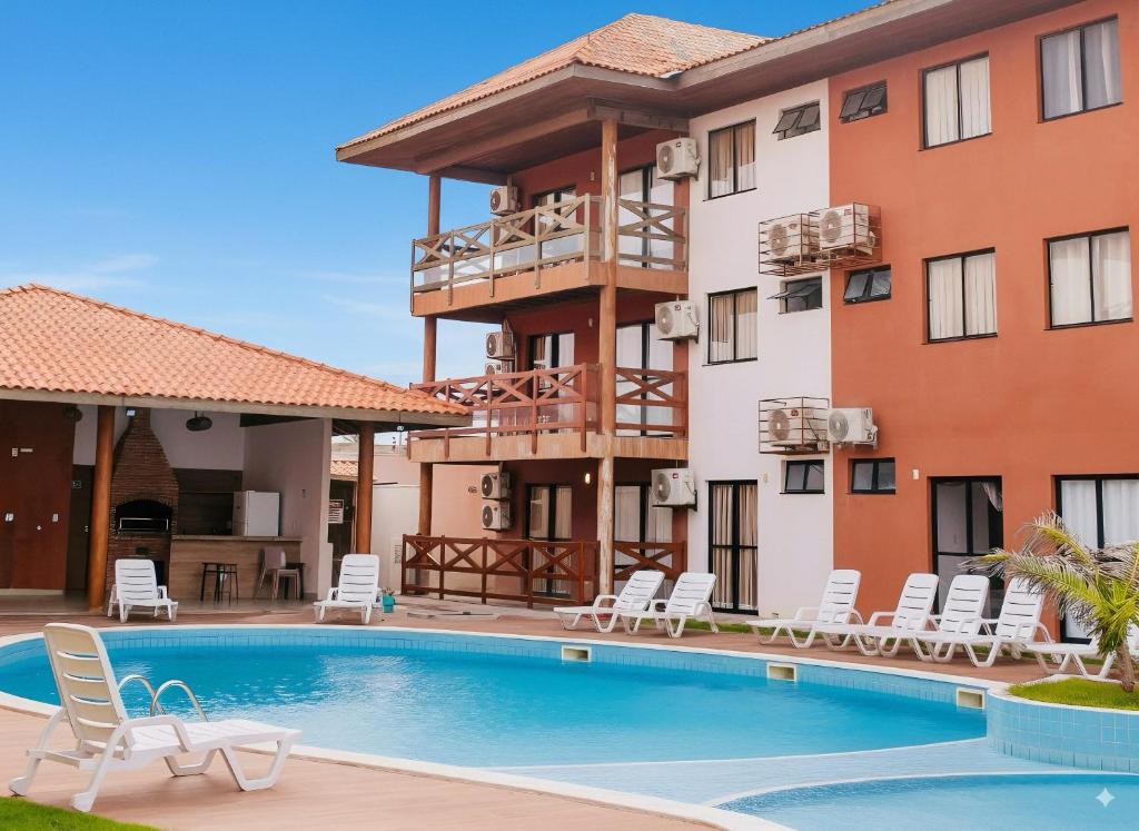 Swimmingpoolen hos eller tæt på Apto Ibiza Praia & Piscina - Conforto e Estilo