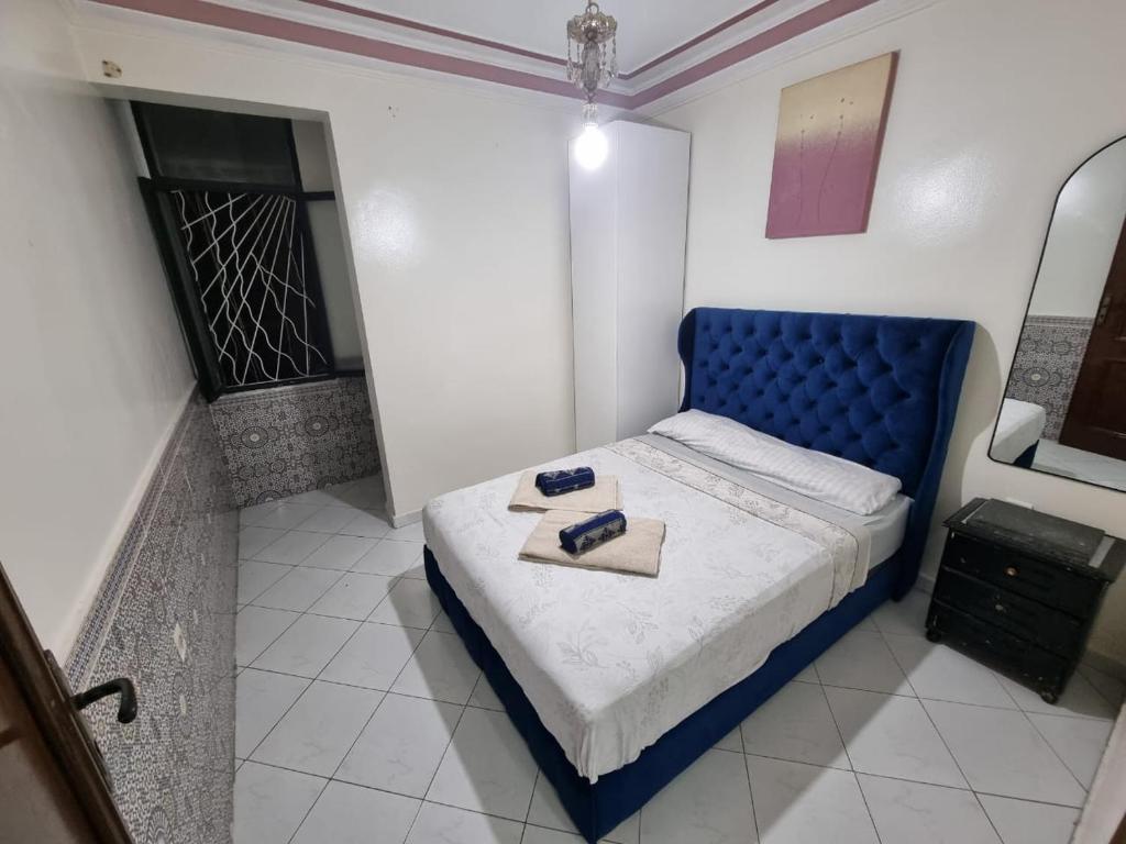 Ένα ή περισσότερα κρεβάτια σε δωμάτιο στο Votre Appartement de Vacances en Plein Cœur Tanger
