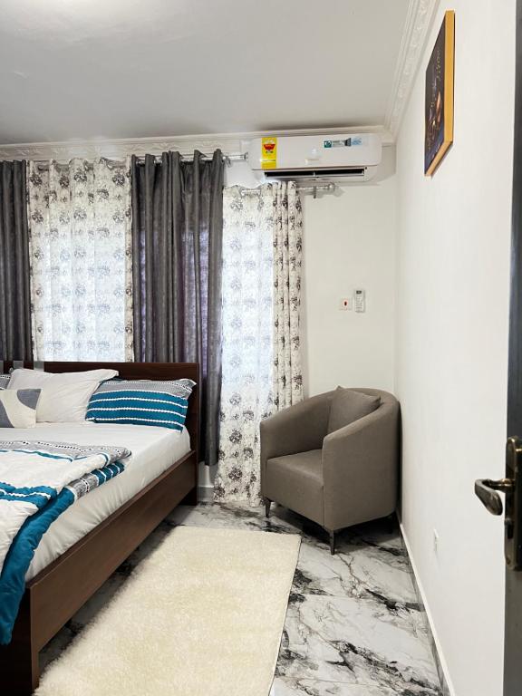 Postel nebo postele na pokoji v ubytování Cozy Lovely 1-bedroom apartment