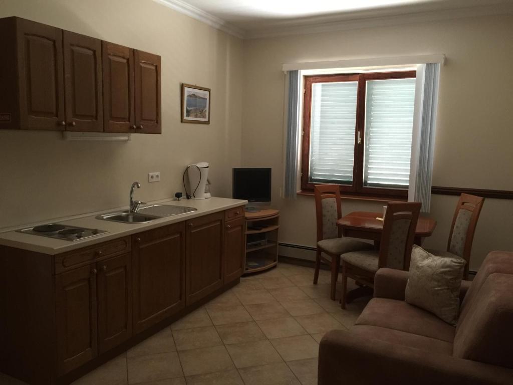 Kuchyňa alebo kuchynka v ubytovaní Americana Luxury Apartments