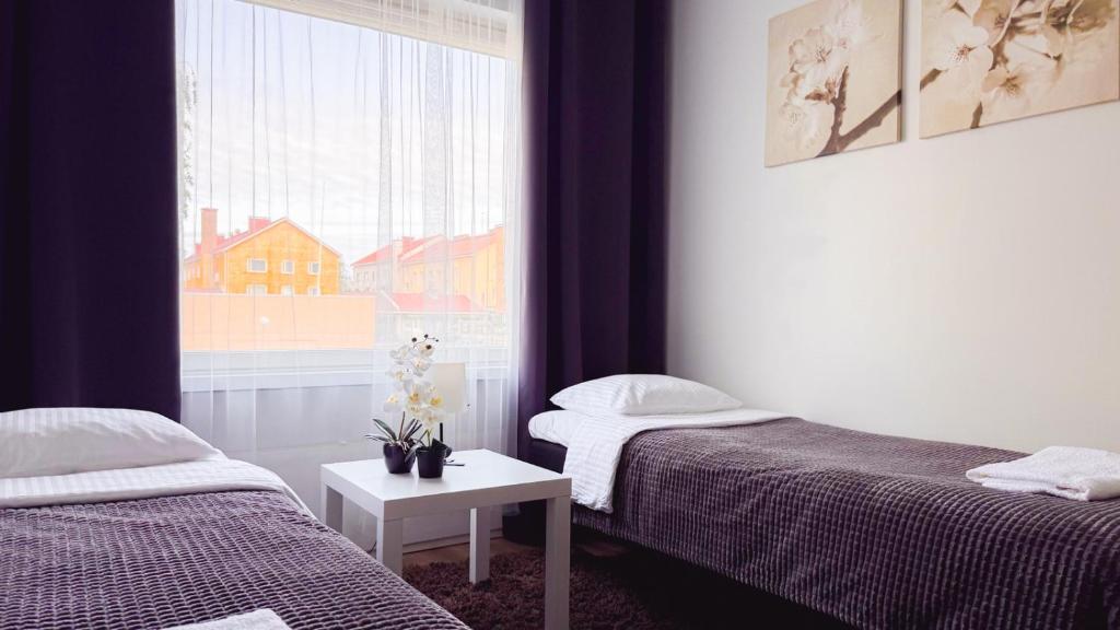 Ένα ή περισσότερα κρεβάτια σε δωμάτιο στο 4-roomIIPerfect locationIICenter