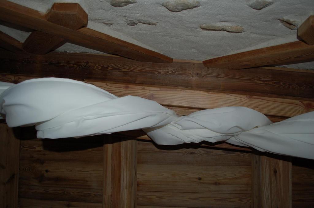 Postel nebo postele na pokoji v ubytování Residenza La Corte Dei Toldi
