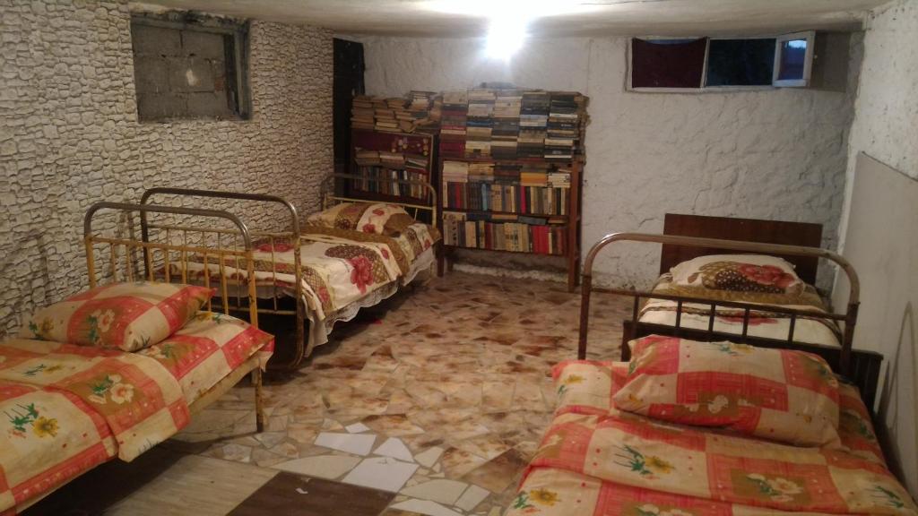 Postel nebo postele na pokoji v ubytování Lemon Family GuestHouse