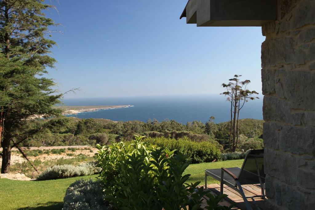 a view of the ocean from a house at Quinta Vale da Roca in Sintra
