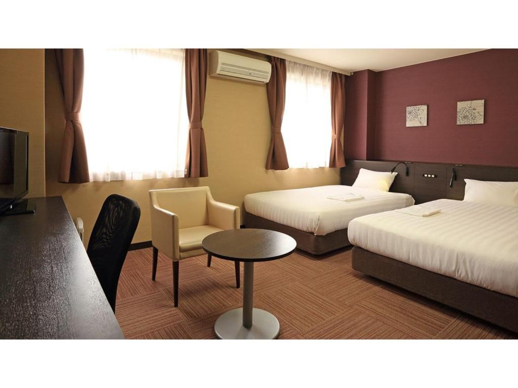 เตียงในห้องที่ Smile Hotel Otsu Seta - Vacation STAY 00138v