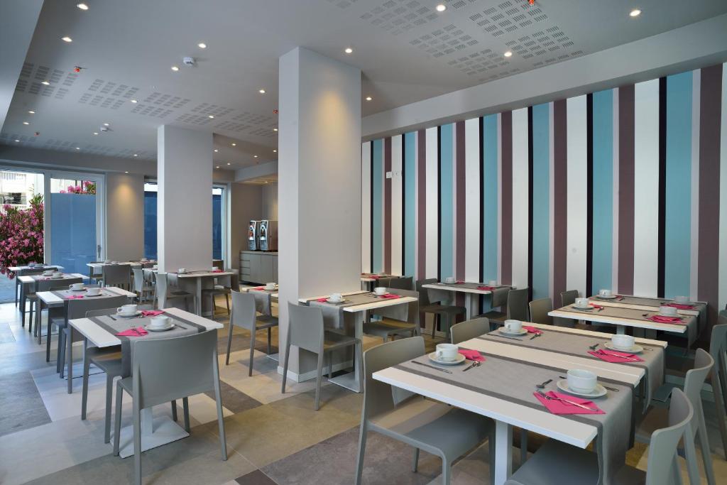 A restaurant or other place to eat at Embassy Hotel & Spa