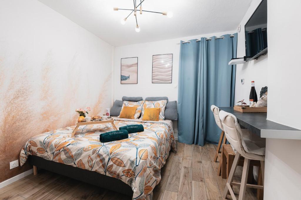 Postel nebo postele na pokoji v ubytování La Terrasse des Chevaliers