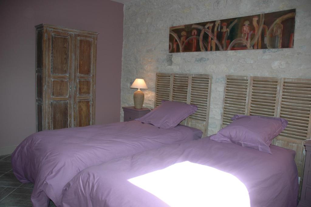 Postel nebo postele na pokoji v ubytování Chambre d'hôtes Au Picatal