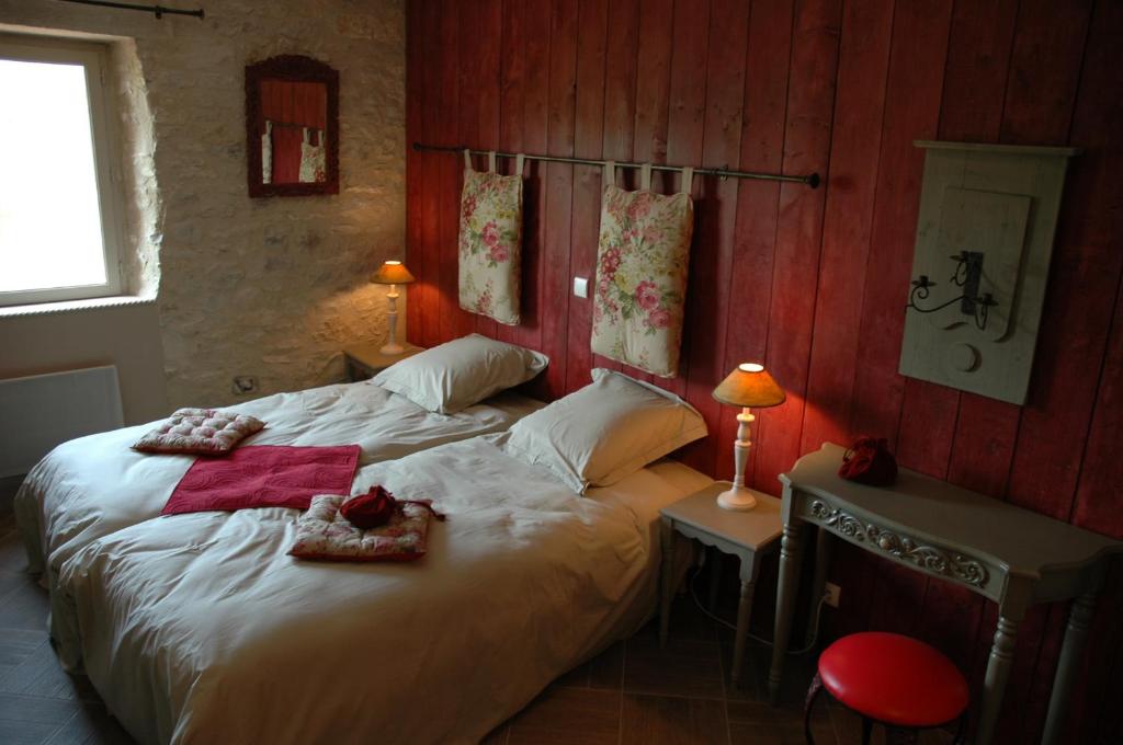 Postel nebo postele na pokoji v ubytování Chambre d'hôtes Au Picatal