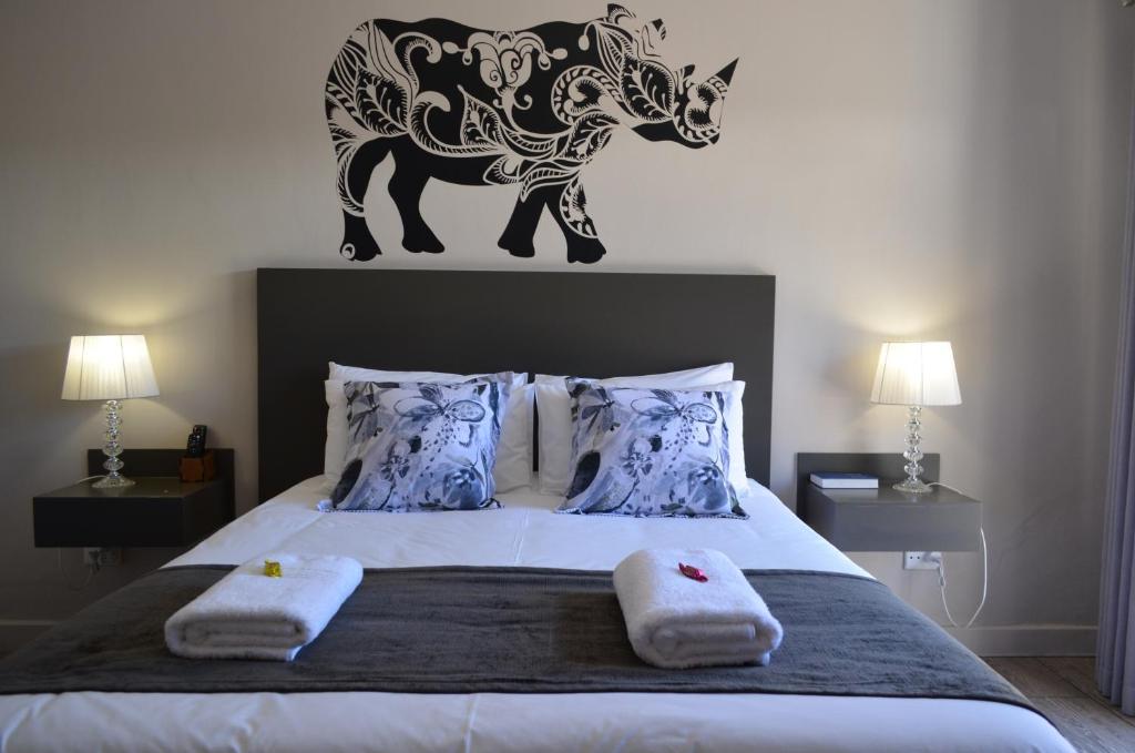 Postel nebo postele na pokoji v ubytování Green Kalahari Guesthouse