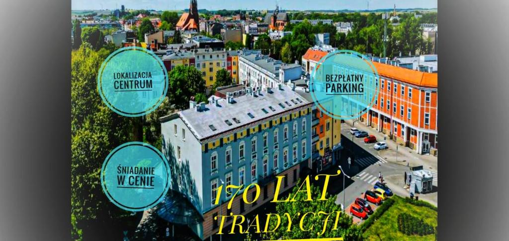 a poster for a hotel in a city with buildings at Polonia Raciborz in Racibórz