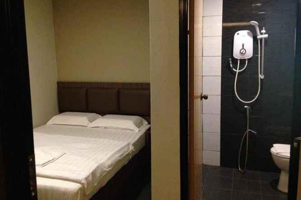 Ένα μπάνιο στο The Cozy Hotel